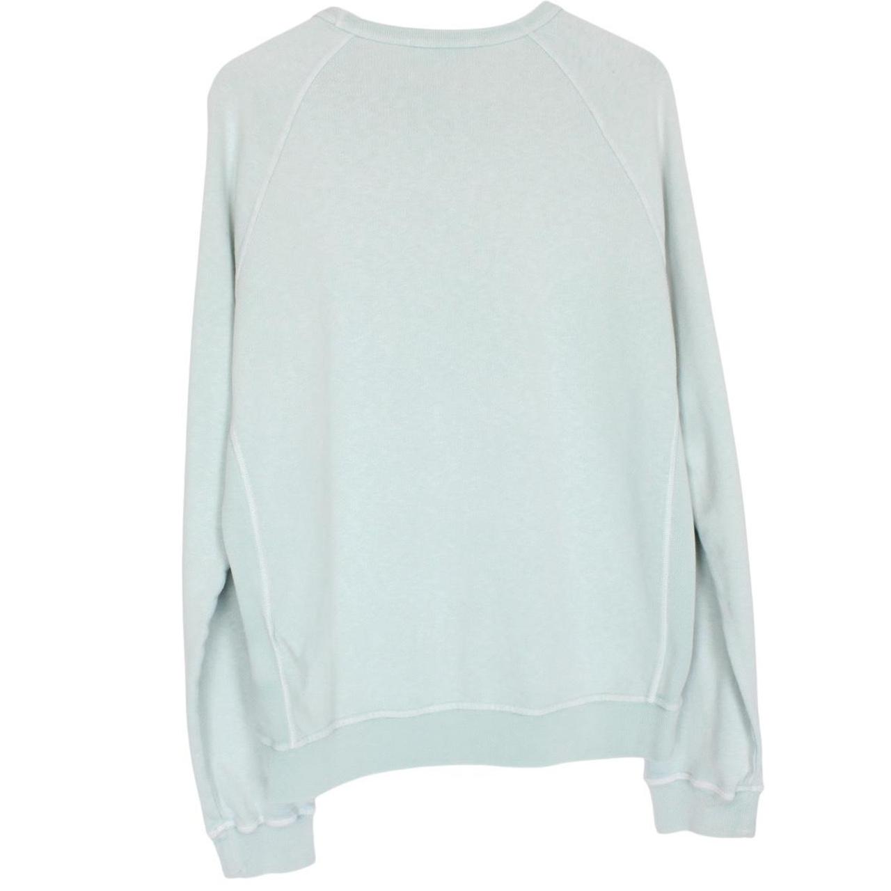 Stone Island mint green cotton sweatshirt with logo patch and ribbed cuffs.