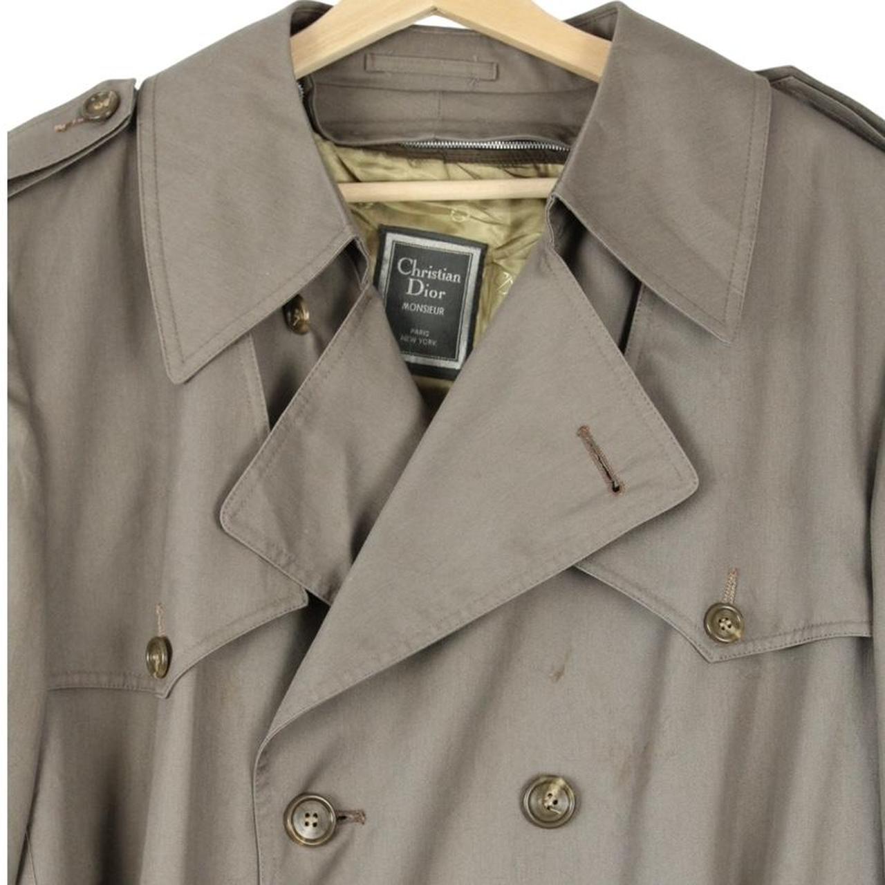 Christian Dior grey double breasted trench coat with removable wool lining and belted waist.