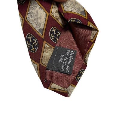 Christian Dior cream silk tie with multicoloured abstract print and logo detail.