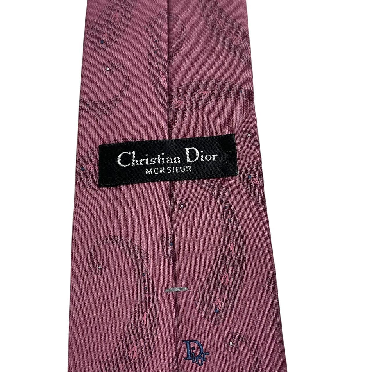Christian Dior pink paisley print tie made of polyester with intricate pattern details.