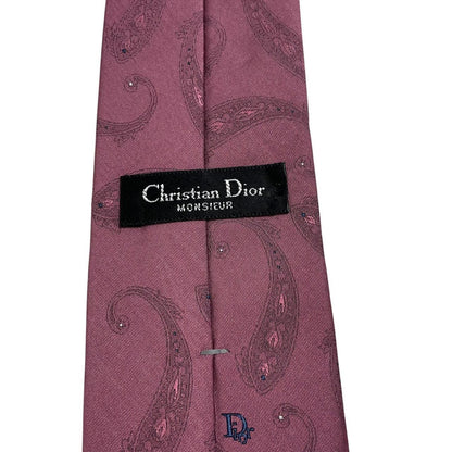 Christian Dior pink paisley print tie made of polyester with intricate pattern details.