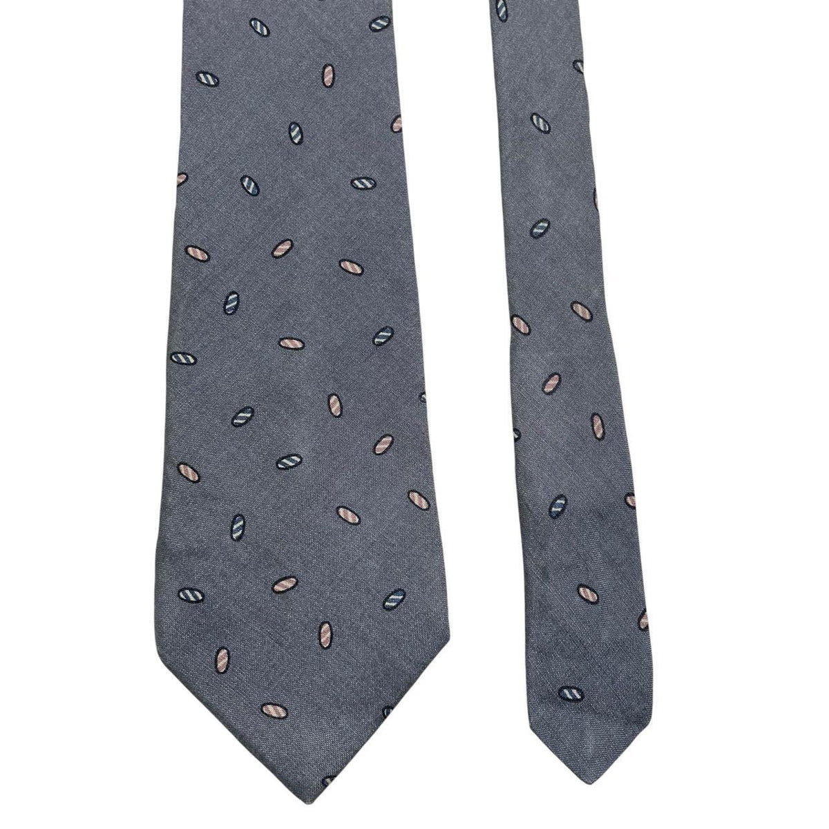 Christian Dior grey silk tie with abstract print and logo detail.
