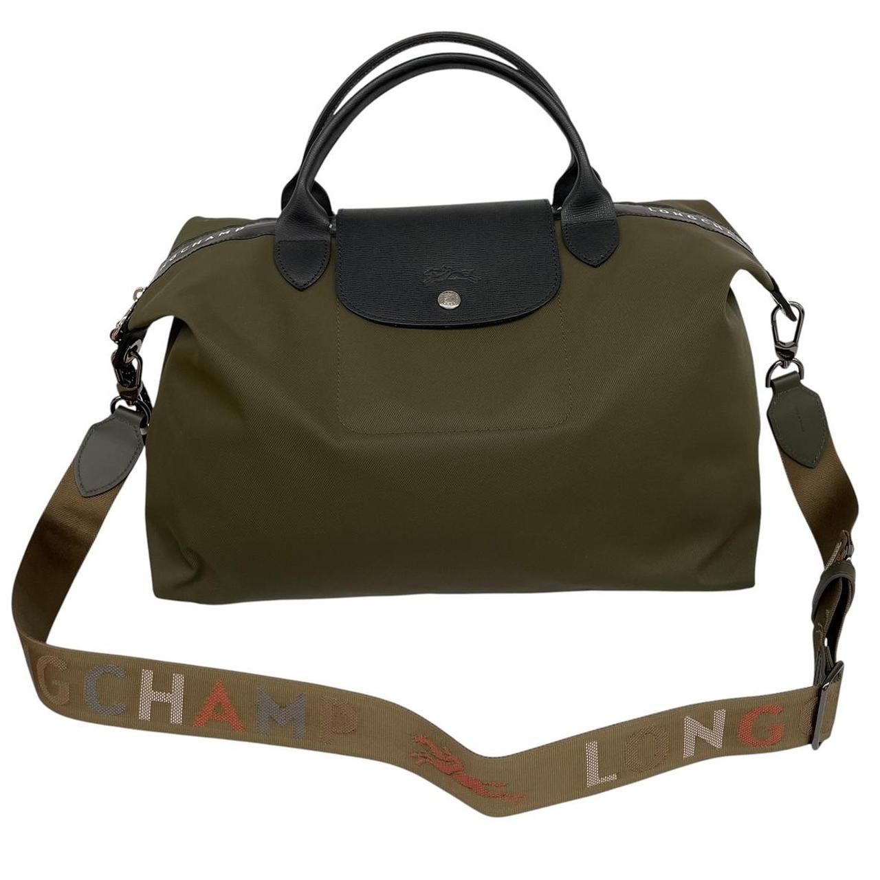 Longchamp green Le Pliage Enery tote bag with logo and durable nylon material.