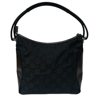 Gucci black hobo shoulder bag with monogram canvas and leather detailing.
