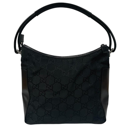 Gucci black hobo shoulder bag with monogram canvas and leather detailing.
