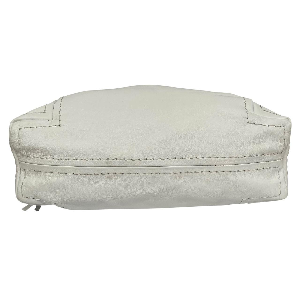 Jimmy Choo white leather hobo bag with subtle marks and logo detail.