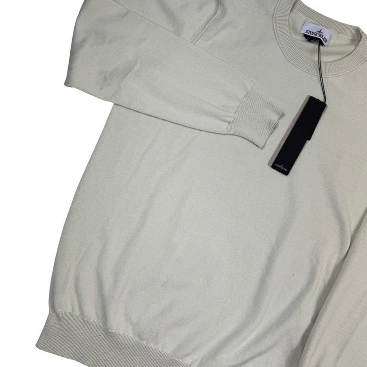 Stone Island beige knit jumper made from organic cotton with logo badge detail.