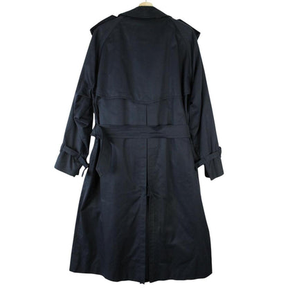 Burberry navy blue belted double breasted trench coat with iconic check lining.
