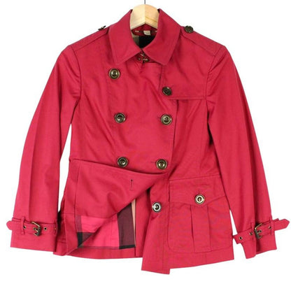 Burberry pink double breasted jacket with Nova Check pattern and logo detail.