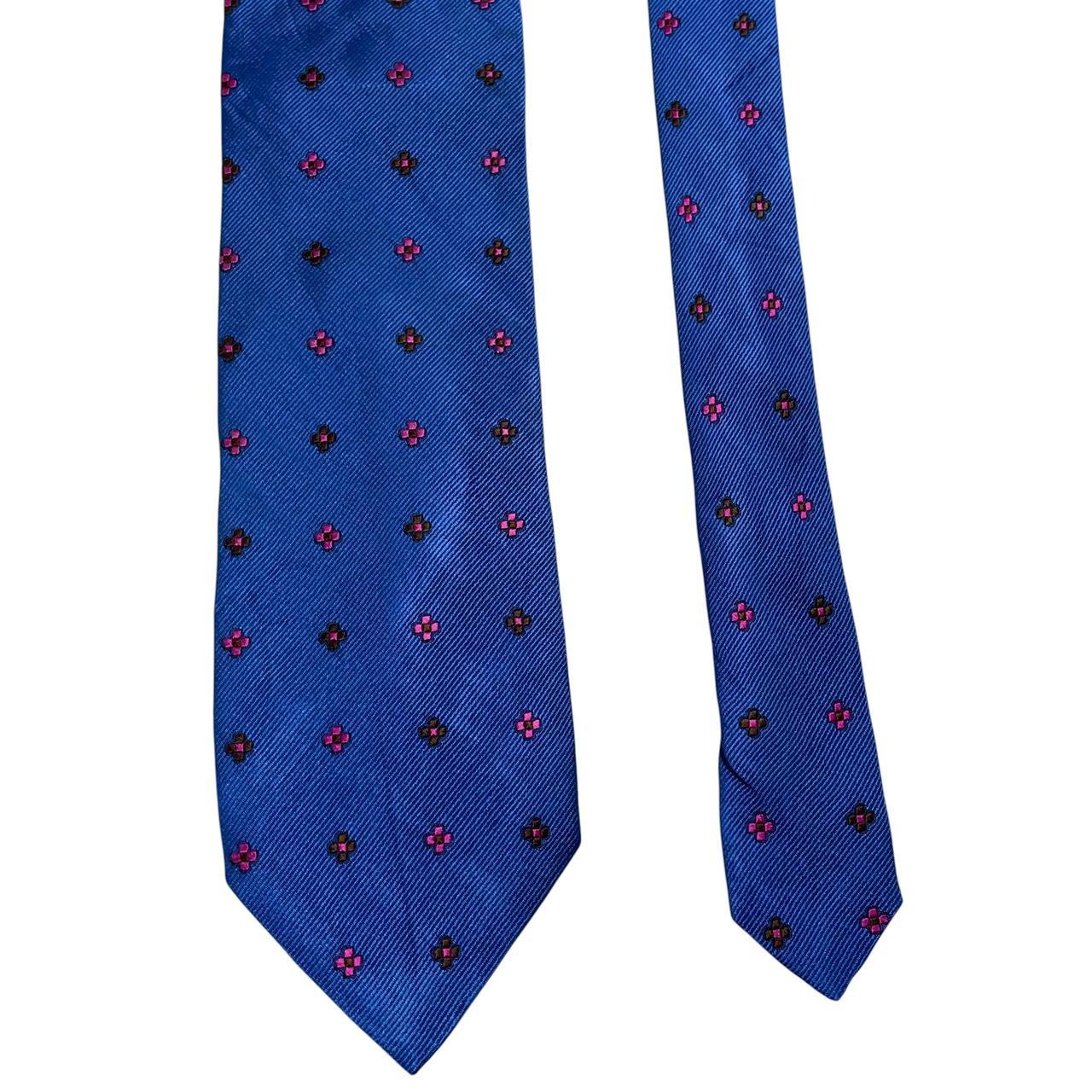 Ermenegildo Zegna blue silk tie with subtle sheen and classic design.