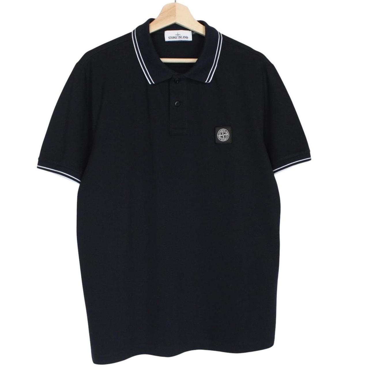 Stone Island navy blue short sleeve polo shirt with compass logo and cotton material.