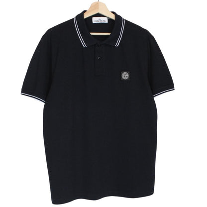 Stone Island navy blue short sleeve polo shirt with compass logo and cotton material.
