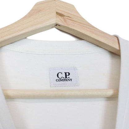 CP Company white short sleeve cotton t-shirt with chest logo print and pocket detail.