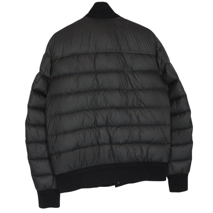 Moncler black suede leather down jacket with full zip and missing badge detail.