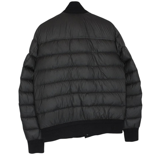 Moncler black suede leather down jacket with full zip and missing badge detail.