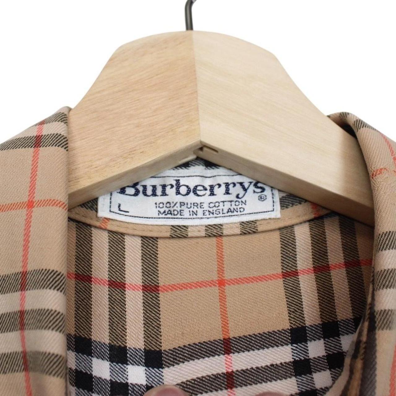 Burberry tan brown long sleeve shirt featuring classic Nova Check pattern in cotton.