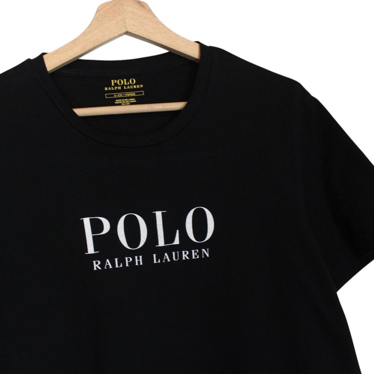 Polo Ralph Lauren black and white pocket t-shirt with logo print and cotton material.