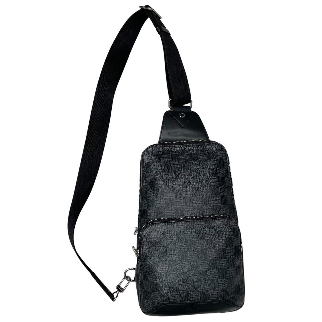 Louis Vuitton duffel bag graphite damier canvas with logo and light signs of use.