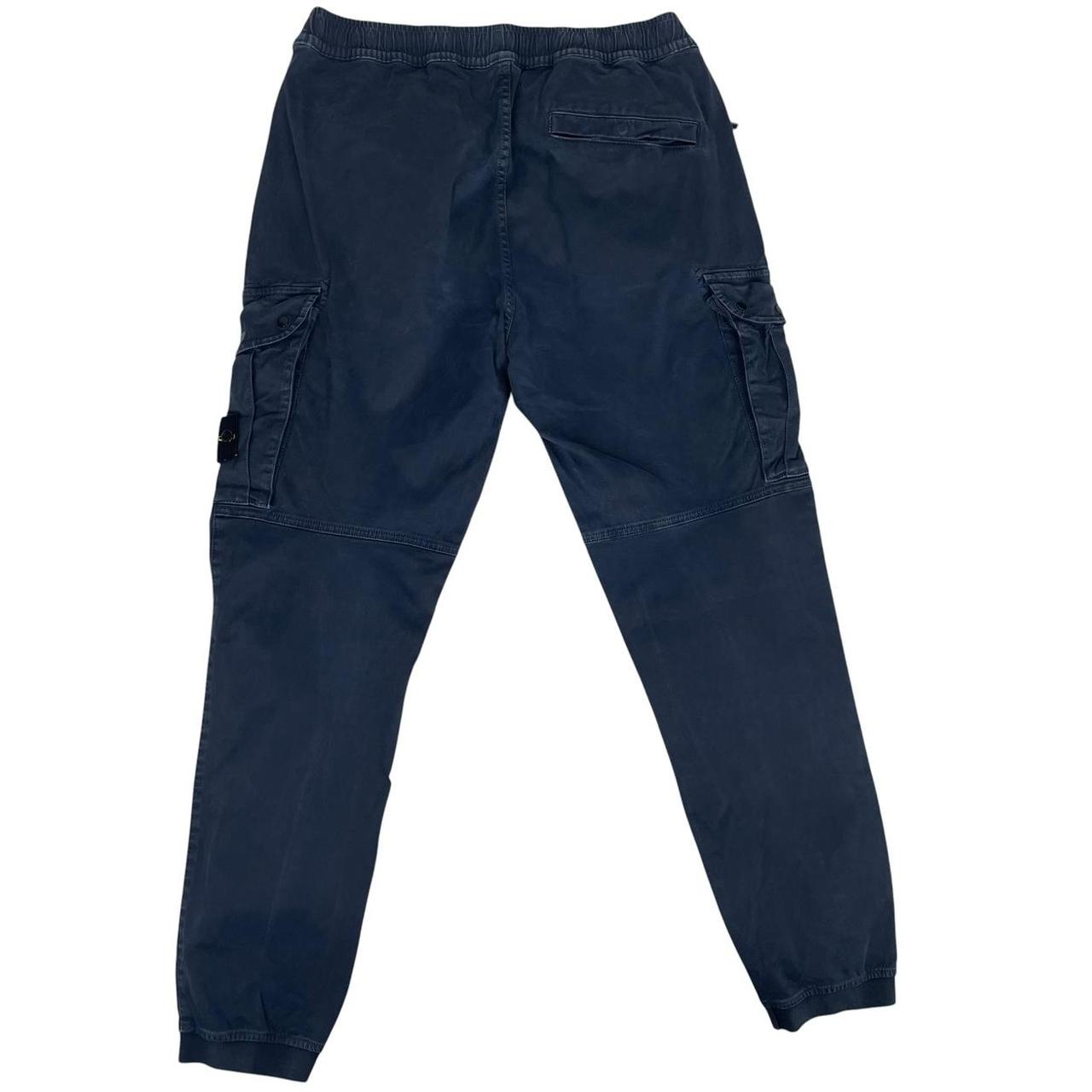 Stone Island navy blue cargo trousers with logo patch and RE-T fit design.