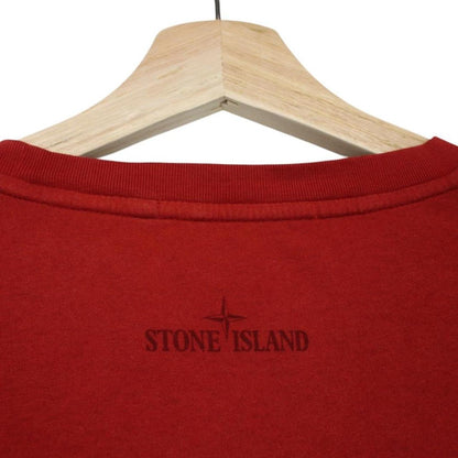 Stone Island red short sleeve t-shirt with reflective logo print and cotton material.