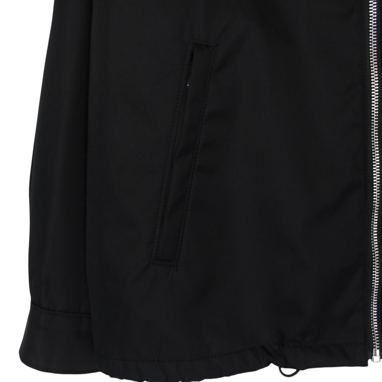 Prada black hooded jacket with full zip, Re-Nylon material, logo detail on sleeve.