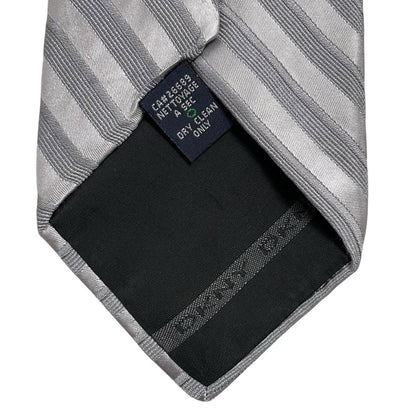 DKNY silver striped silk tie with elegant sheen and vintage design.