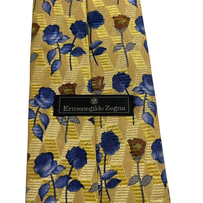 Ermenegildo Zegna yellow silk tie with floral pattern and logo detail.