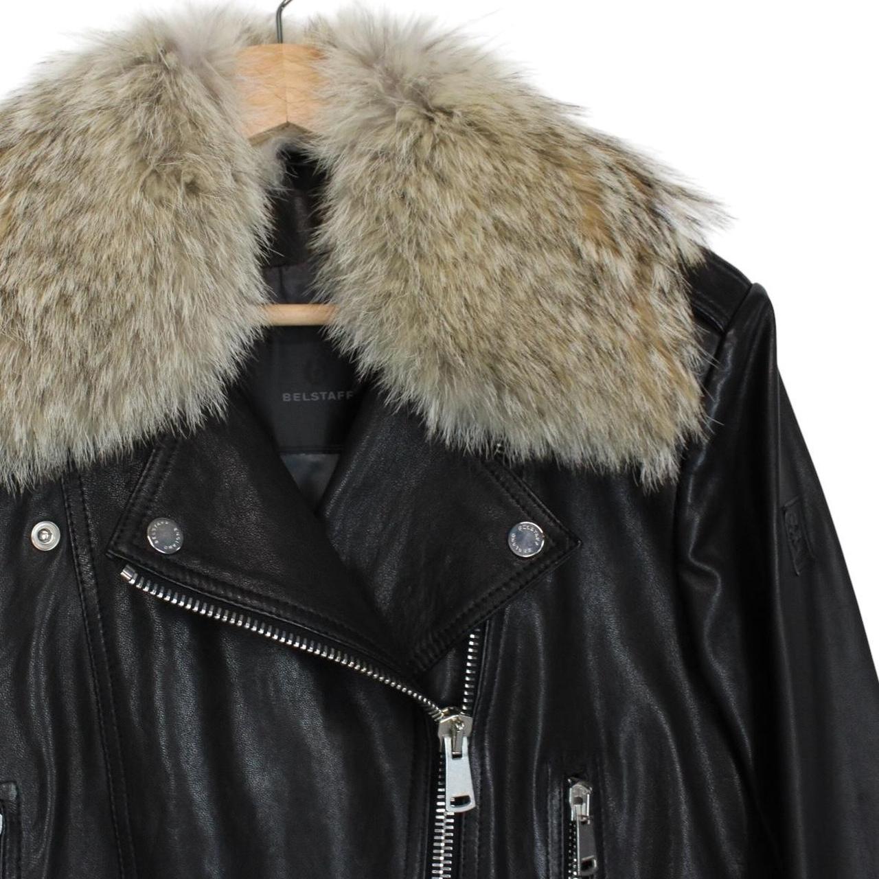 Belstaff black leather biker jacket with detachable coyote fur collar and logo detailing.