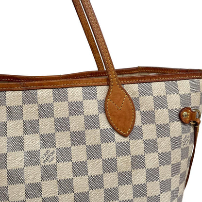 Louis Vuitton cream Damier Azur tote bag with leather trim and logo pattern.