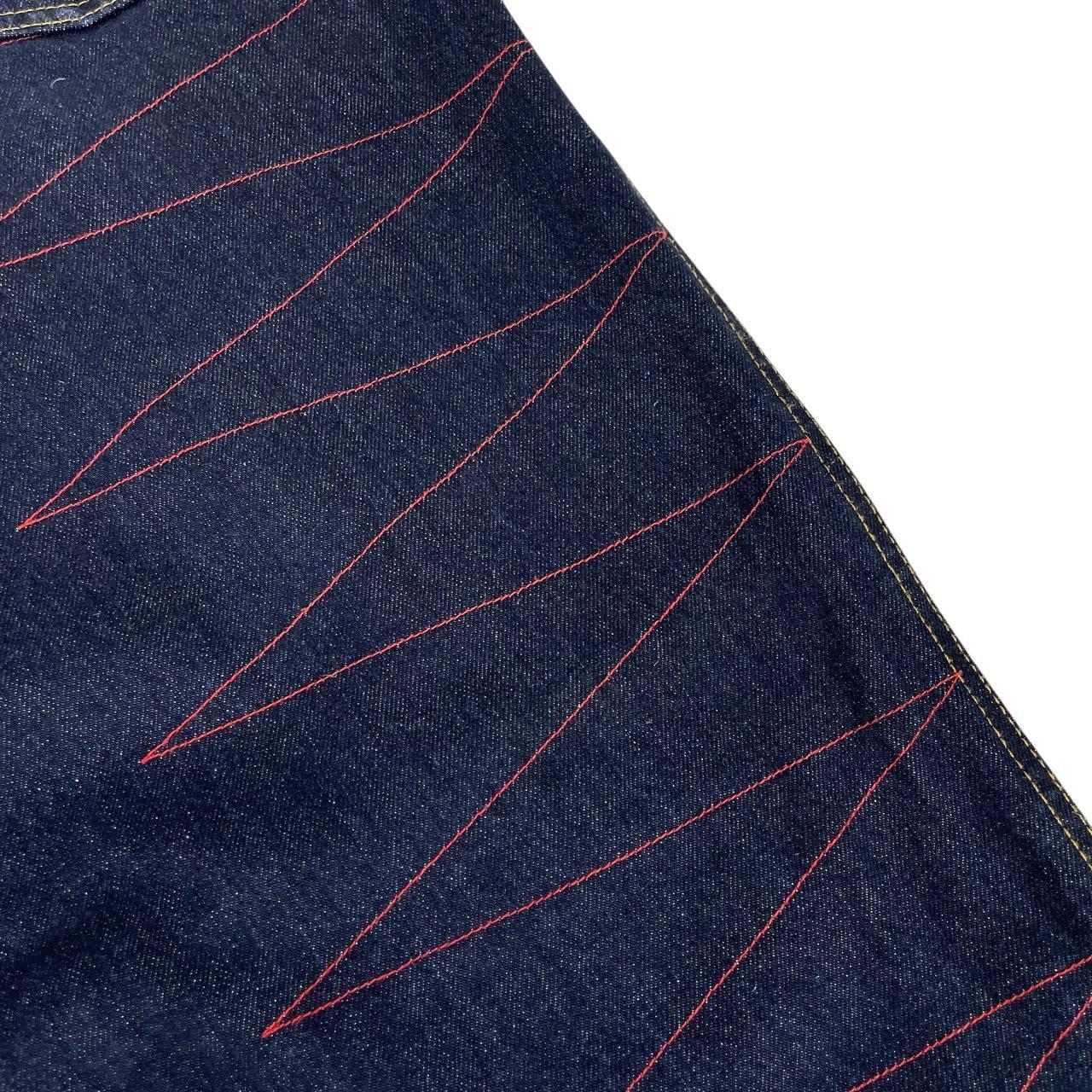 Palace straight jeans navy blue with red embroidered details and logo patch.