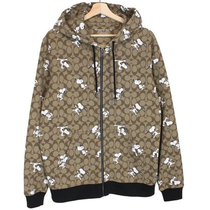 Coach brown hoodie featuring Peanuts Snoopy graphic and full zip design.