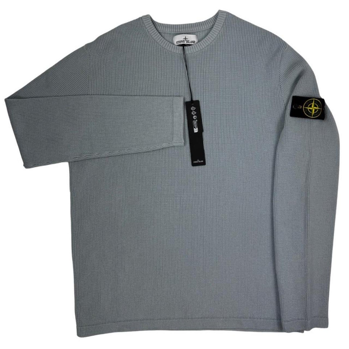 Stone Island grey waffle knit jumper with logo patch and organic cotton material.