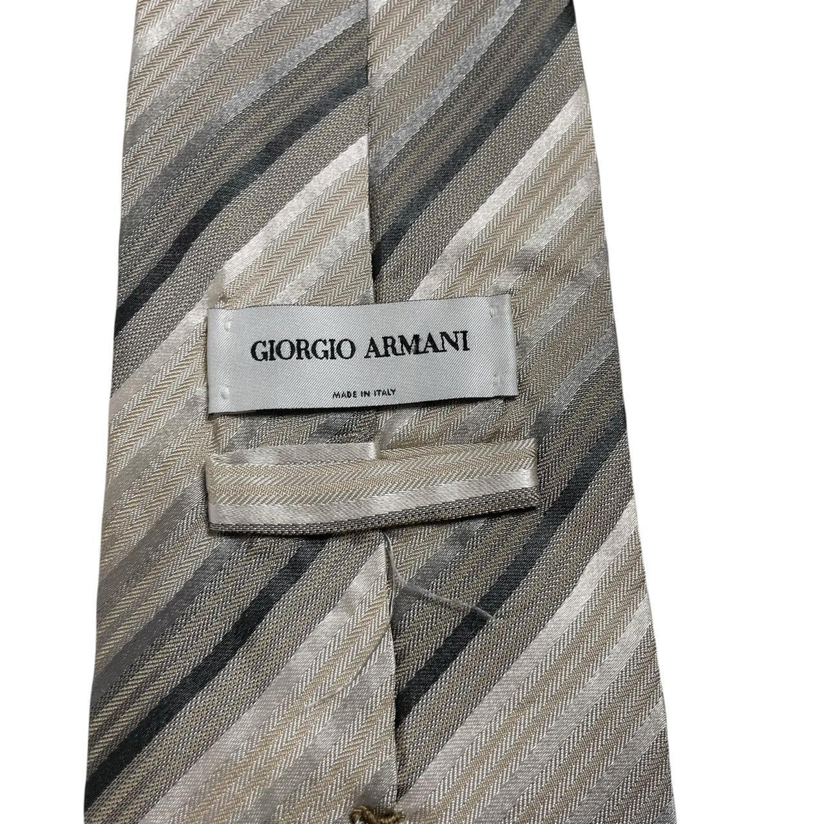 Giorgio Armani multicoloured striped silk tie featuring beige, black, brown, and grey stripes.