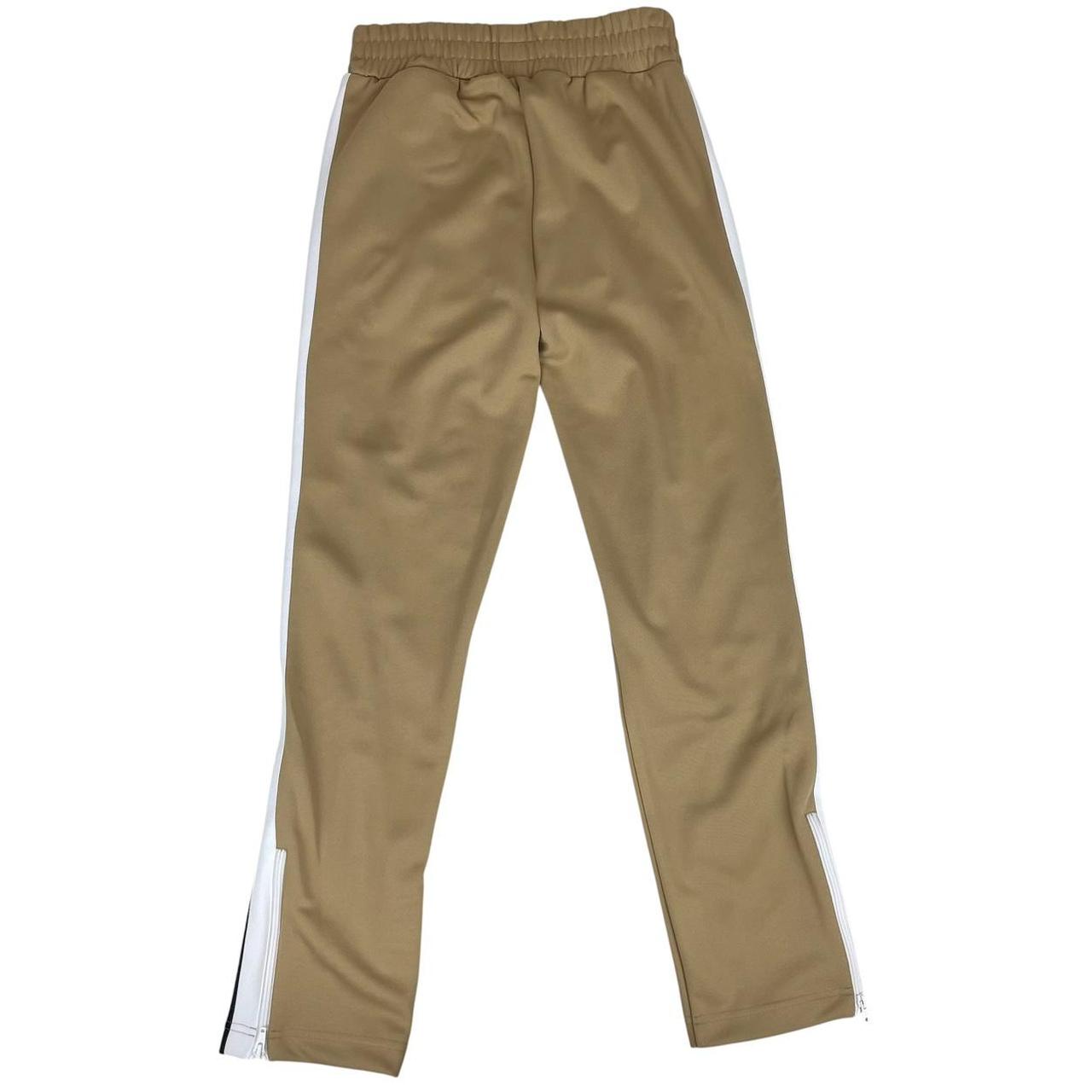 Palm Angels beige and white joggers with logo detail and classic design.
