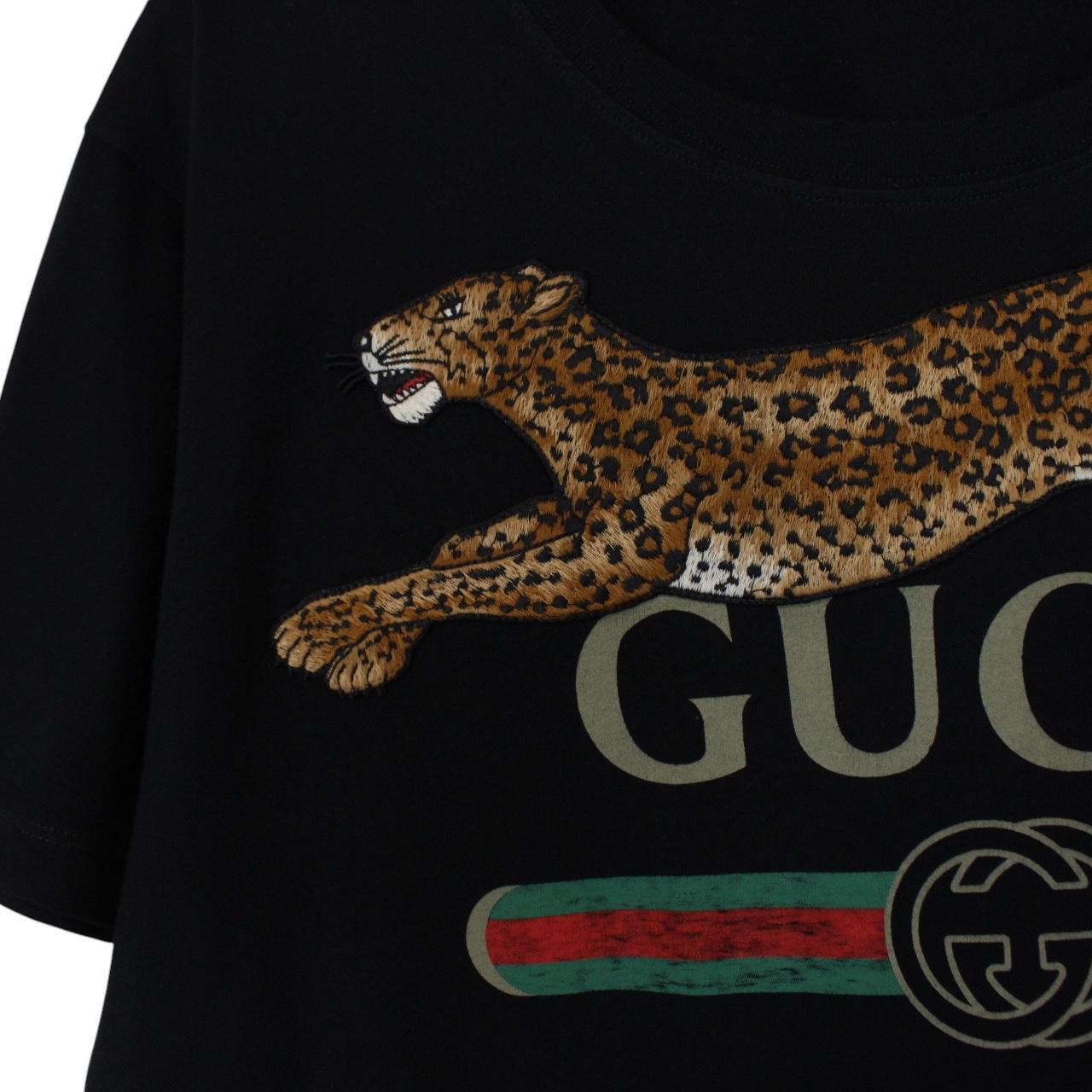 Gucci black cotton t-shirt with embroidered leopard print and oversized fit.