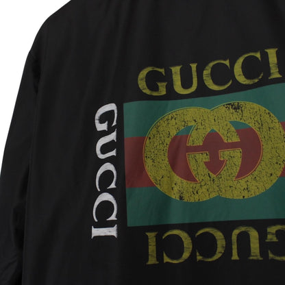 Gucci black windbreaker jacket with logo print and full zip, made of nylon.