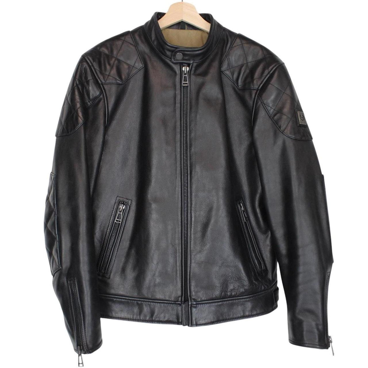 Belstaff black leather jacket with full zip and classic logo detailing.
