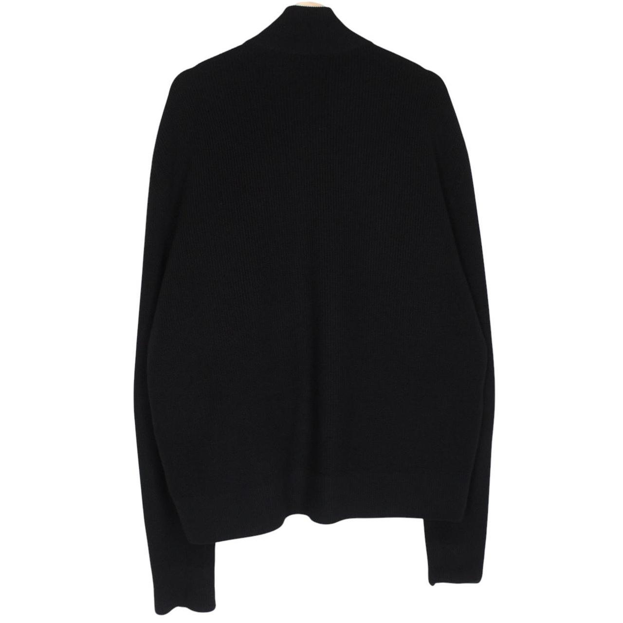 Moncler black cardigan jacket with full zip, wool/nylon blend, and logo detail.