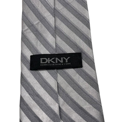 DKNY silver striped silk tie with elegant sheen and vintage design.