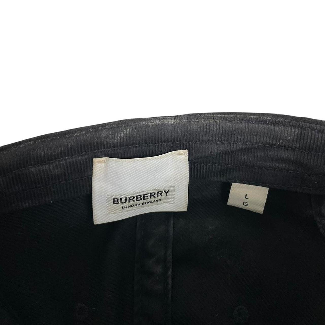 Burberry black baseball cap with red Horseferry logo embroidery and worn condition.