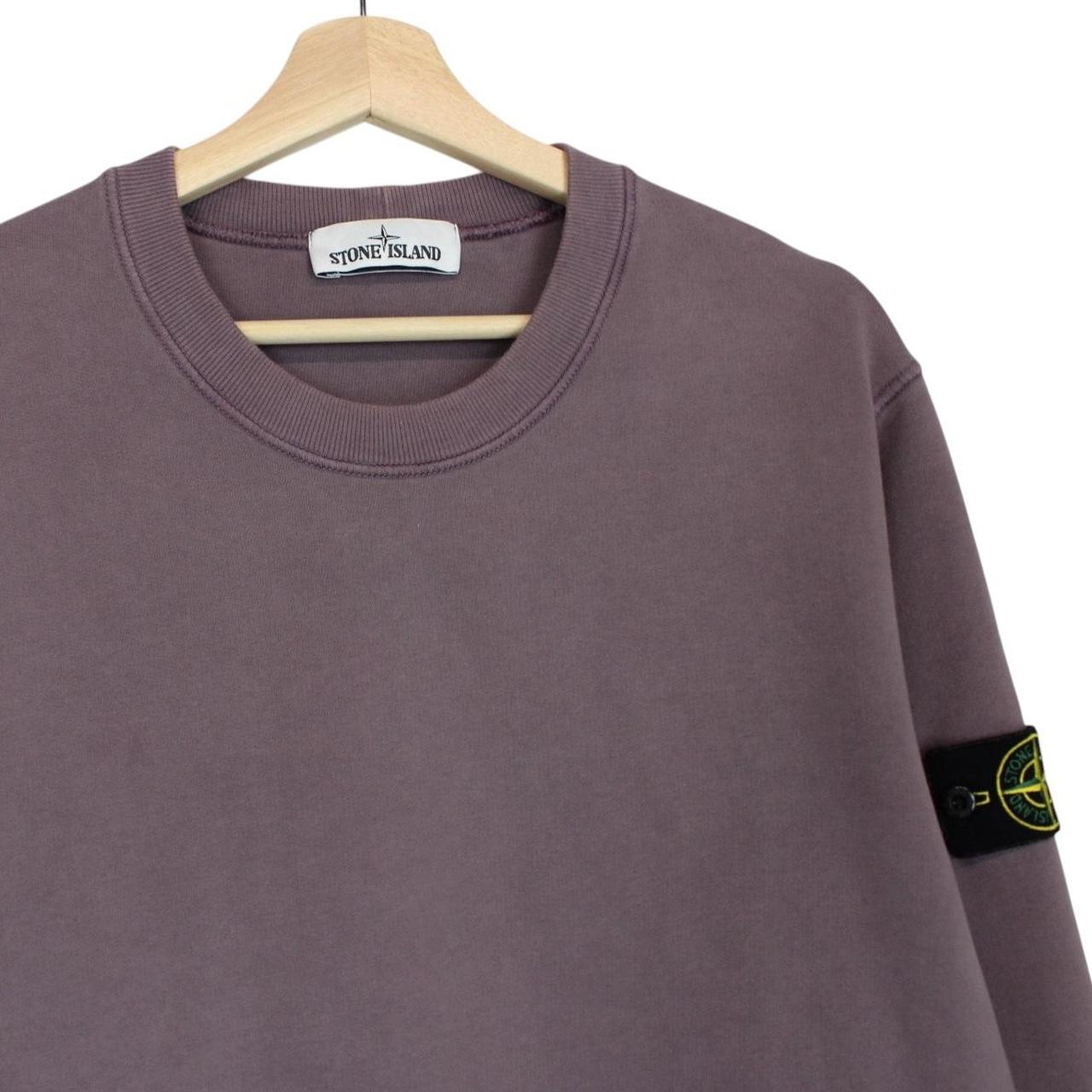 Stone Island mauve pink cotton sweatshirt with iconic compass logo patch.
