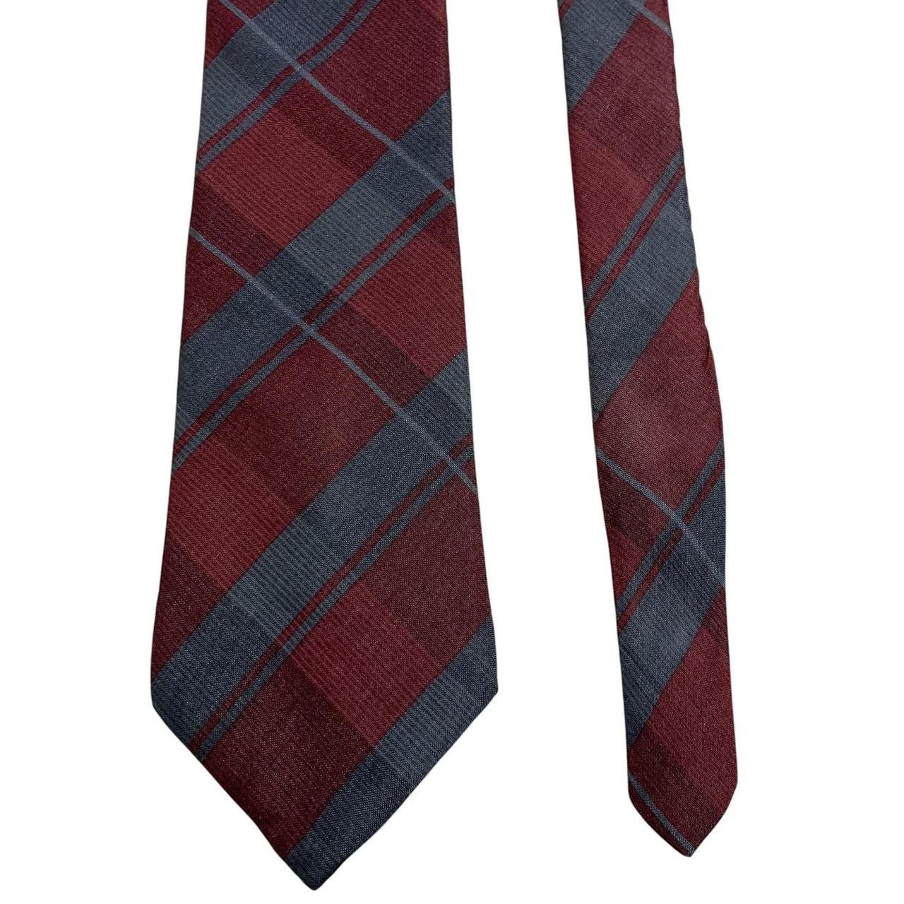 Christian Dior silk tie burgundy and blue check pattern with logo detail.