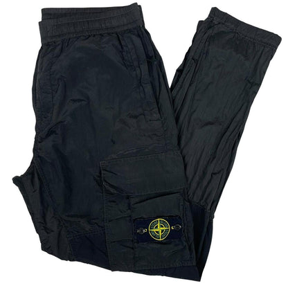 Stone Island black cargo trousers with logo patch and nylon material, size W33.