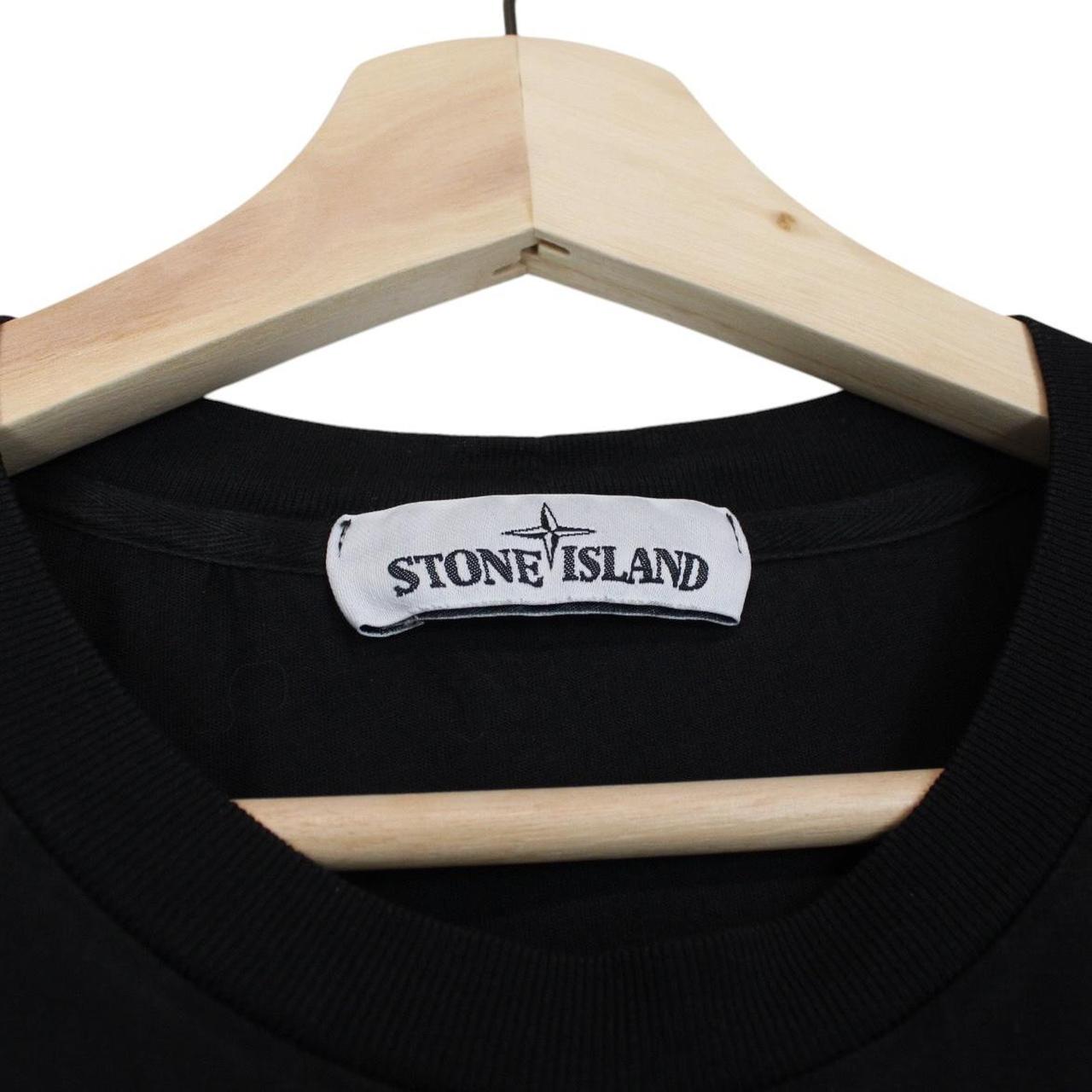 Stone Island black short sleeve t-shirt with compass logo and pocket detail.