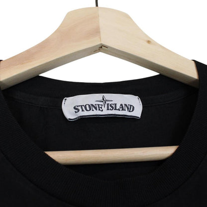 Stone Island black short sleeve t-shirt with compass logo and pocket detail.