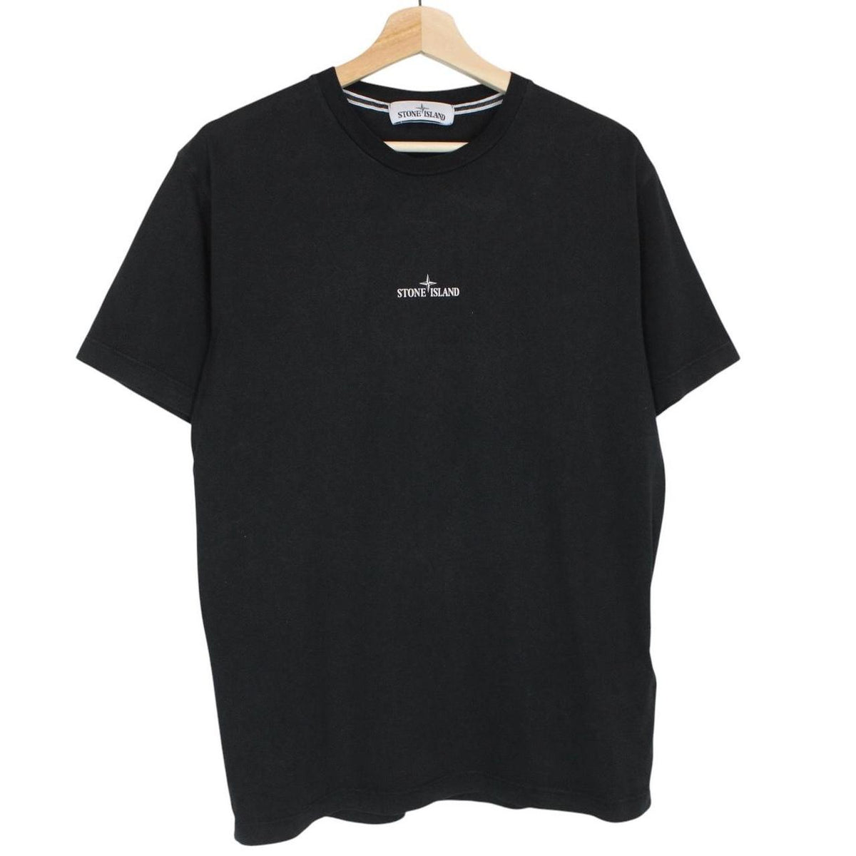 Stone Island black short sleeve t-shirt with logo print on chest and cotton material.