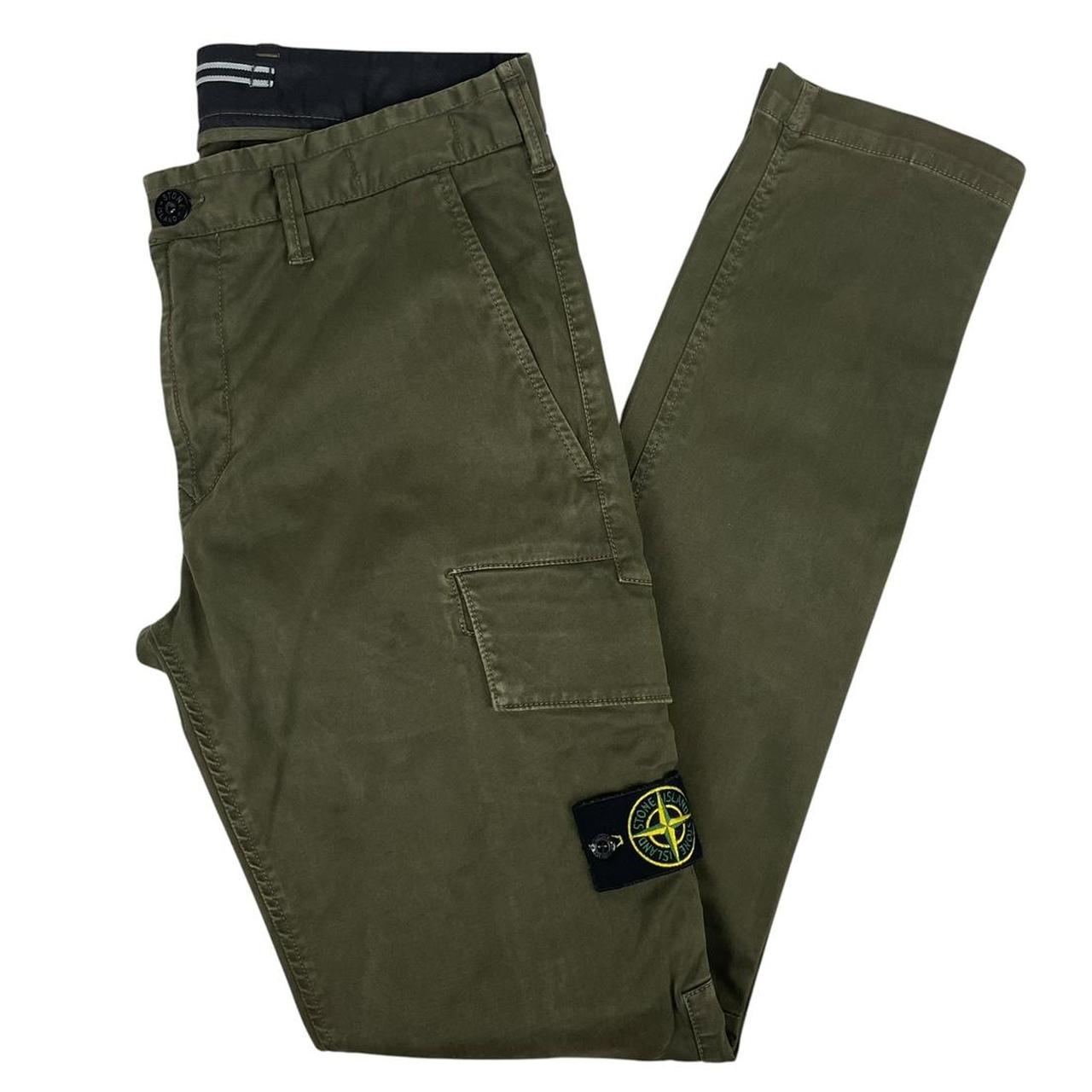 Stone Island khaki green skinny fit cargo trousers with logo patch and pockets.