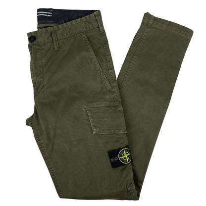 Stone Island khaki green skinny fit cargo trousers with logo patch and pockets.