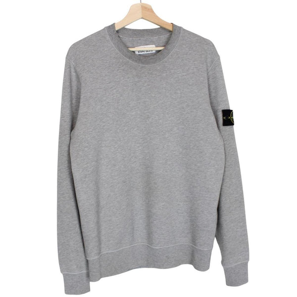 Stone Island grey cotton sweatshirt with logo patch and soft texture.
