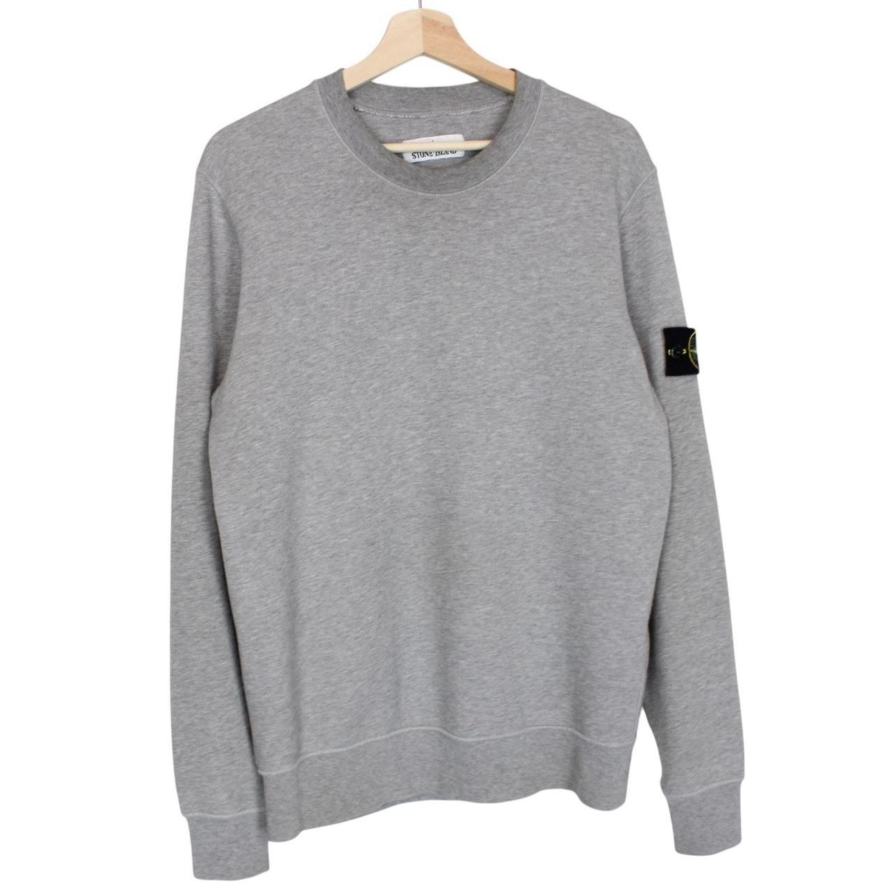 Stone Island grey cotton sweatshirt with logo patch and soft texture.